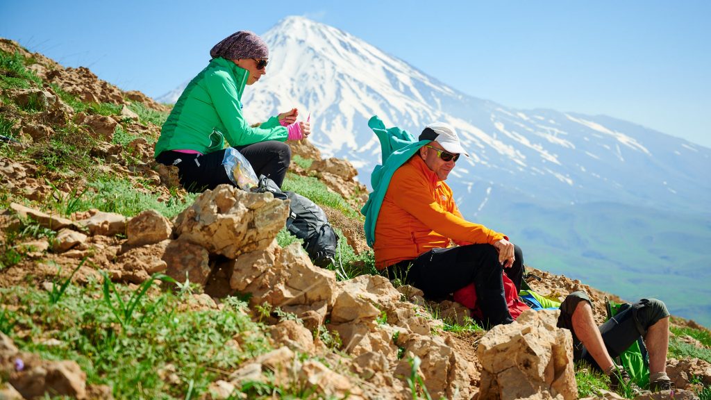 Climbers with a view of Mount Damavand in Iran