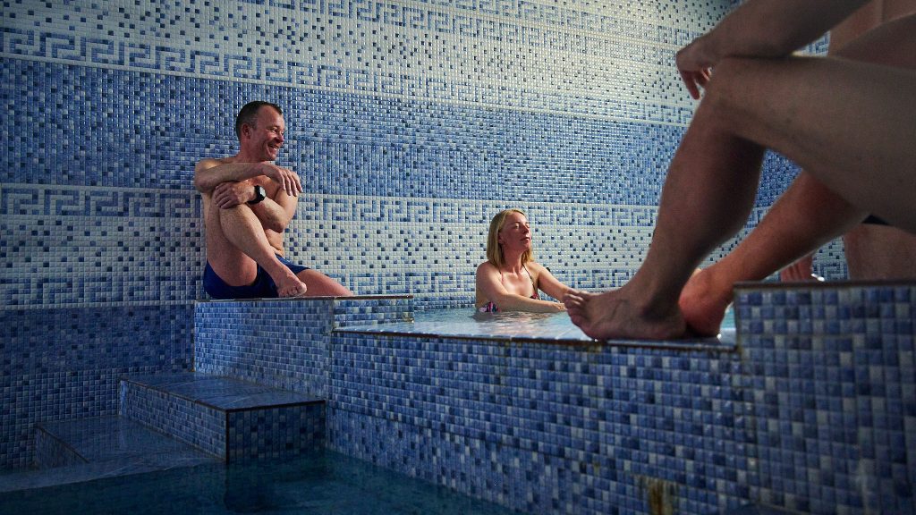 Alpinists relaxing in a bathhouse in Iran