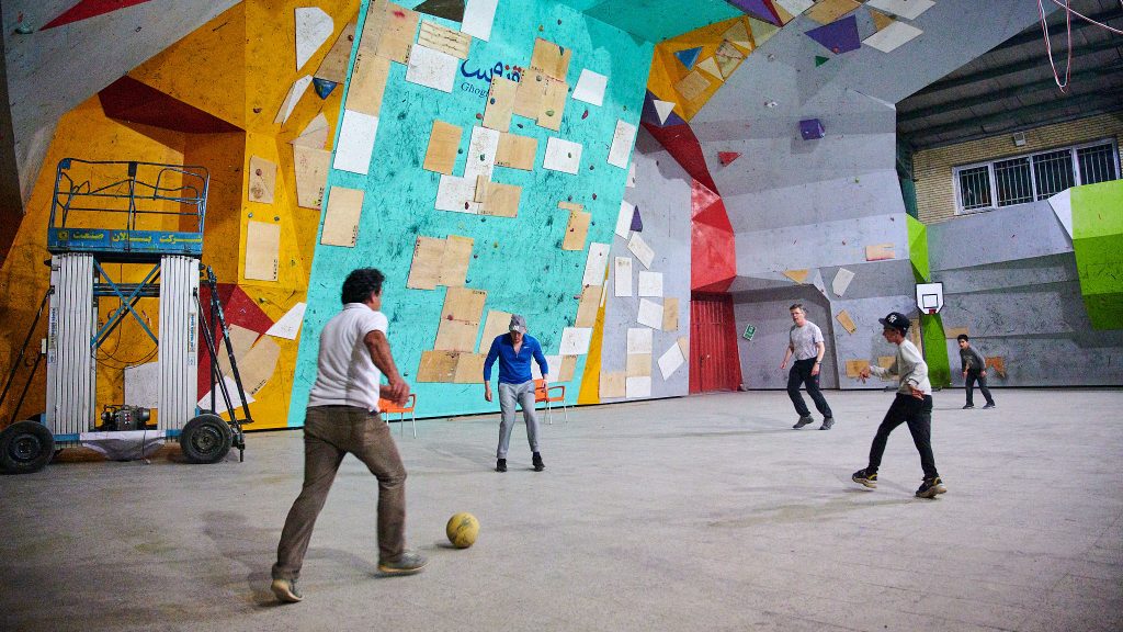 Playing football in a climbing gym at the foot of Mount Damavand in Iran