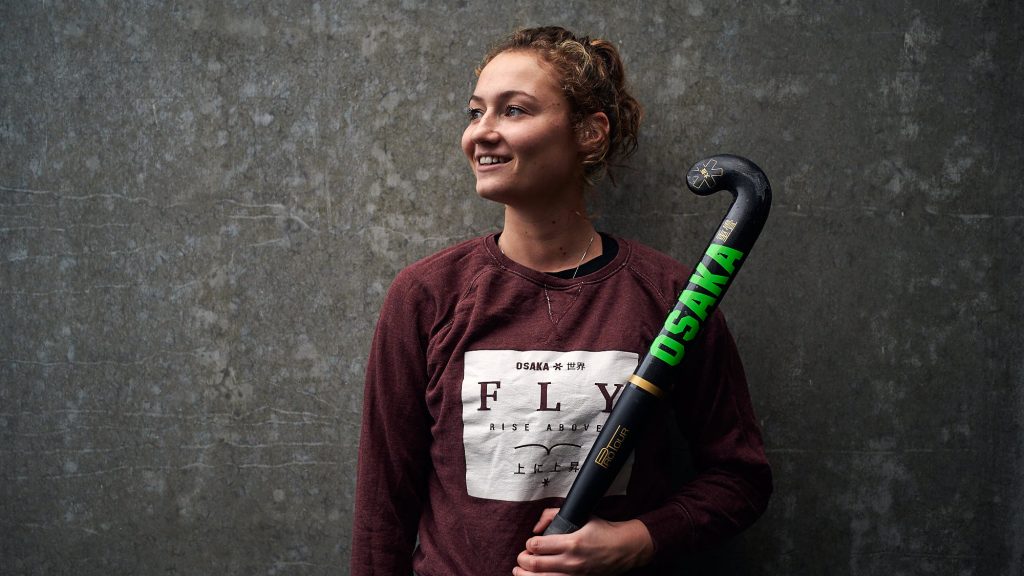 Dutch hockey player Marijn Veen holding a stick