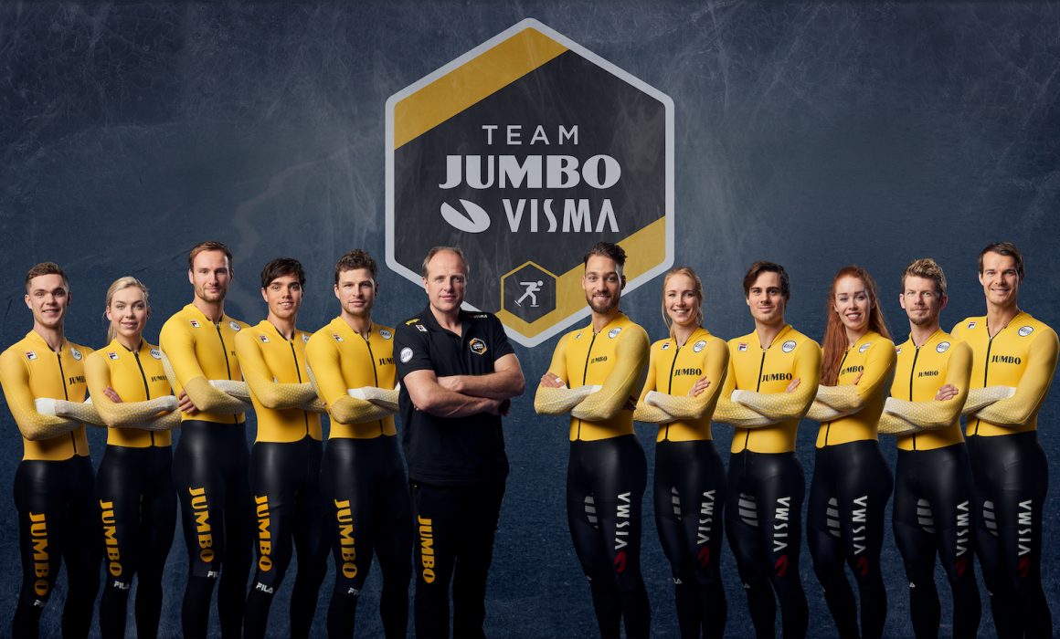 Group photo of the Jumbo-Visma ice skating team in 2019