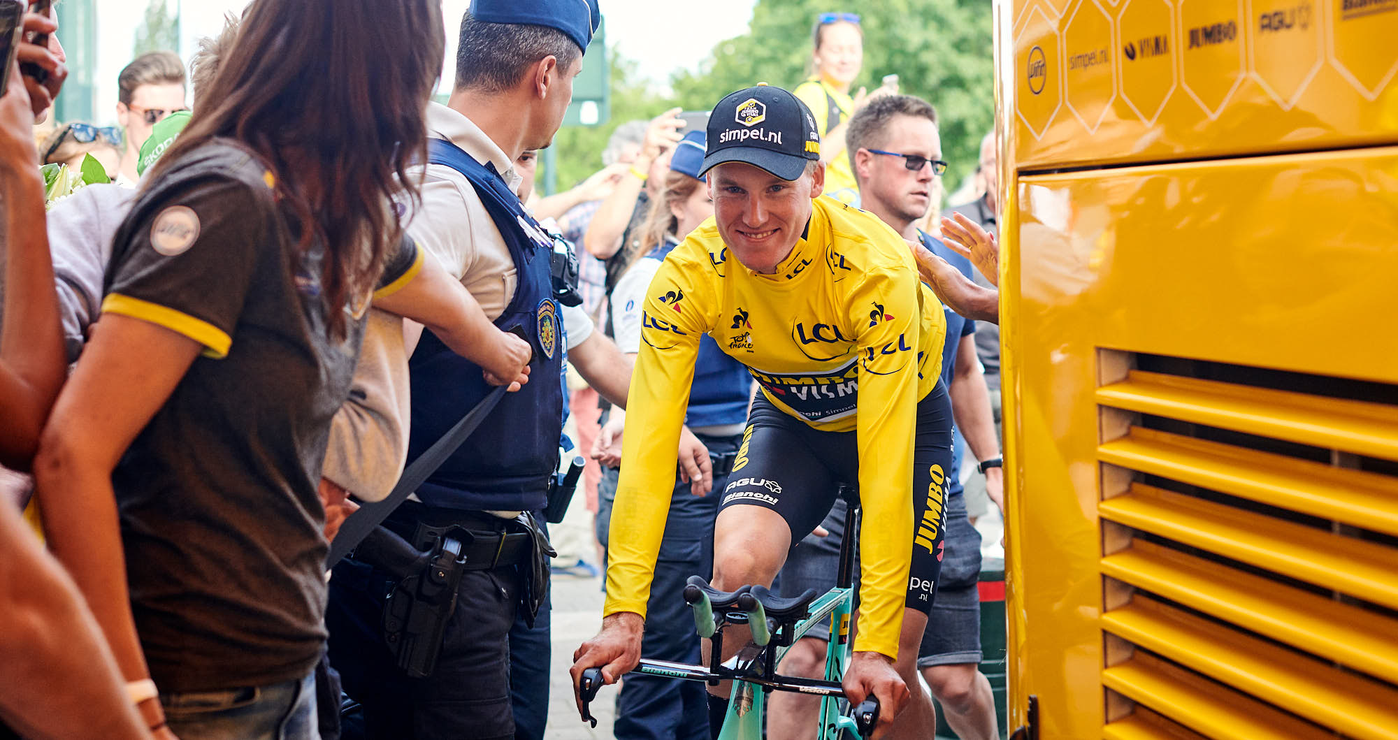 Mike Teunissen arriving at the team Jumbo-Visma bus after the team time trial in the 2019 Tour de France