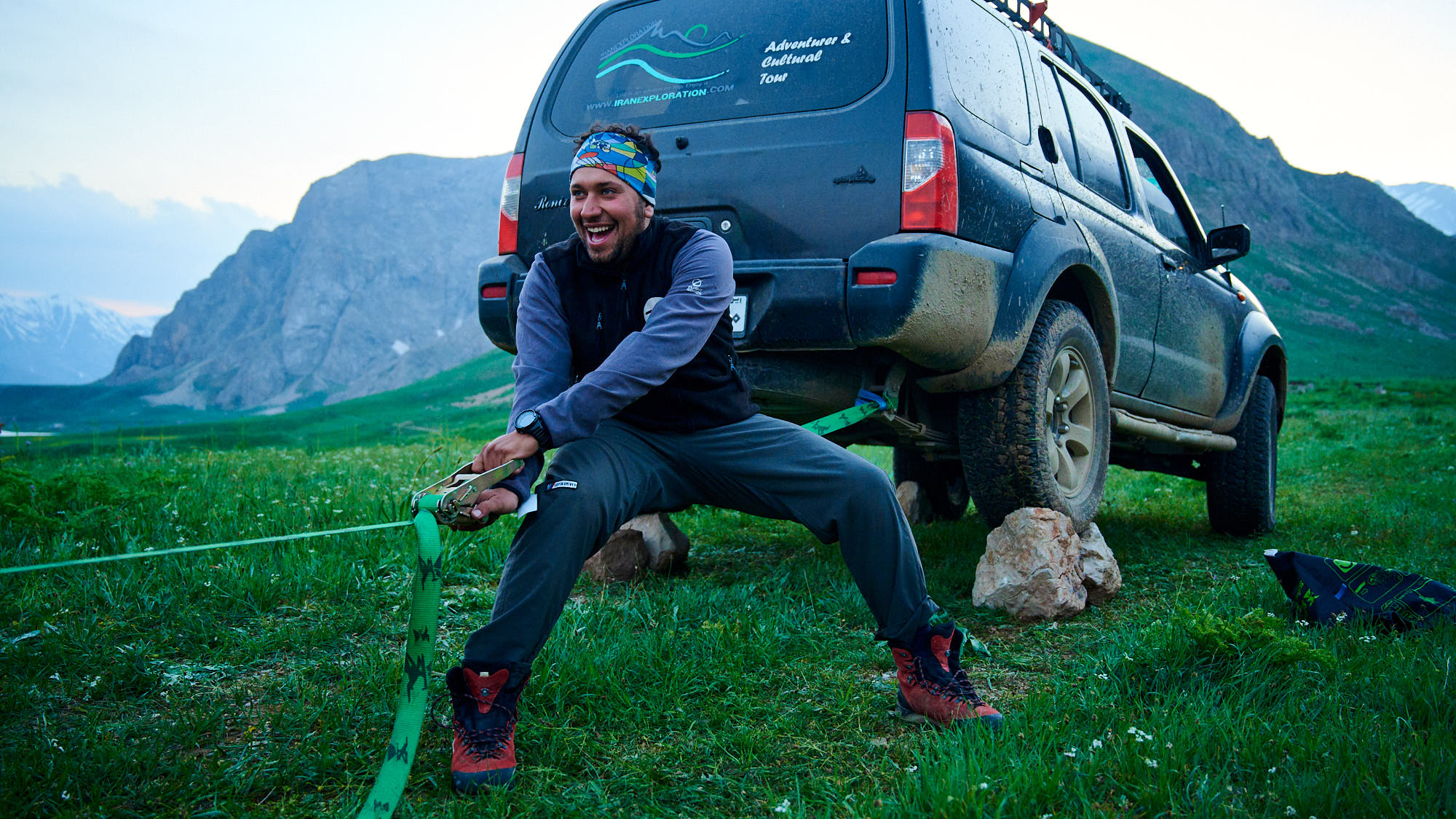 Rigging a slackline in Dar valley in Iran
