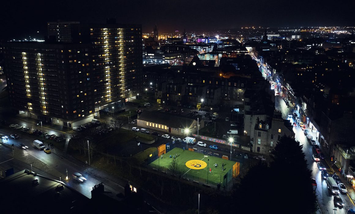 Nightly aerial view of a Cruyff Court in Aberdeen, Scotland